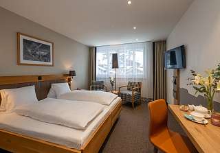 Chambre double Standard Nova sans balcon, avec lit double et coin salon